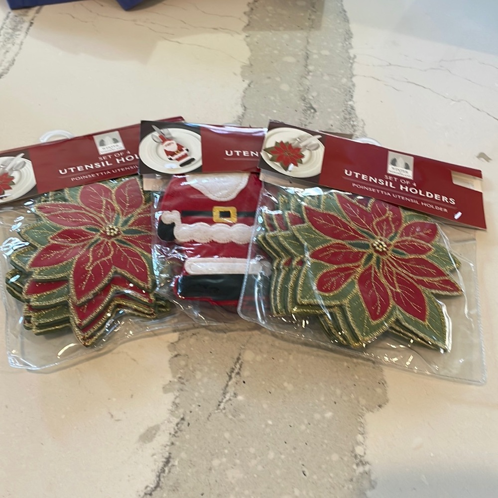 Brand new, never opened 3 sets of 4 utensil holders for Christmas table.